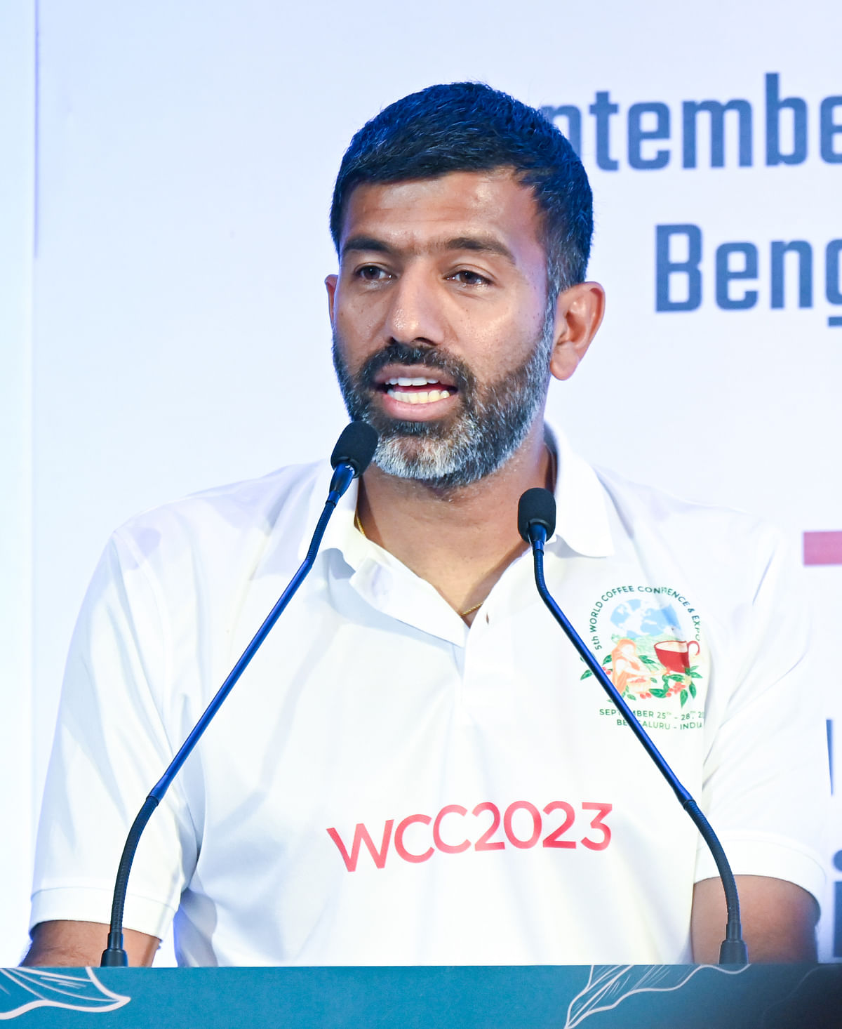 India’s Tennis Player Rohan Bopanna addressing after he Unveiling the new logo of 5th World Coffee Conference- 2023 and he become brand ambassador during the curtain raiser at a hotel in Bengaluru on Monday. DH Photo/ B H Shivakumar