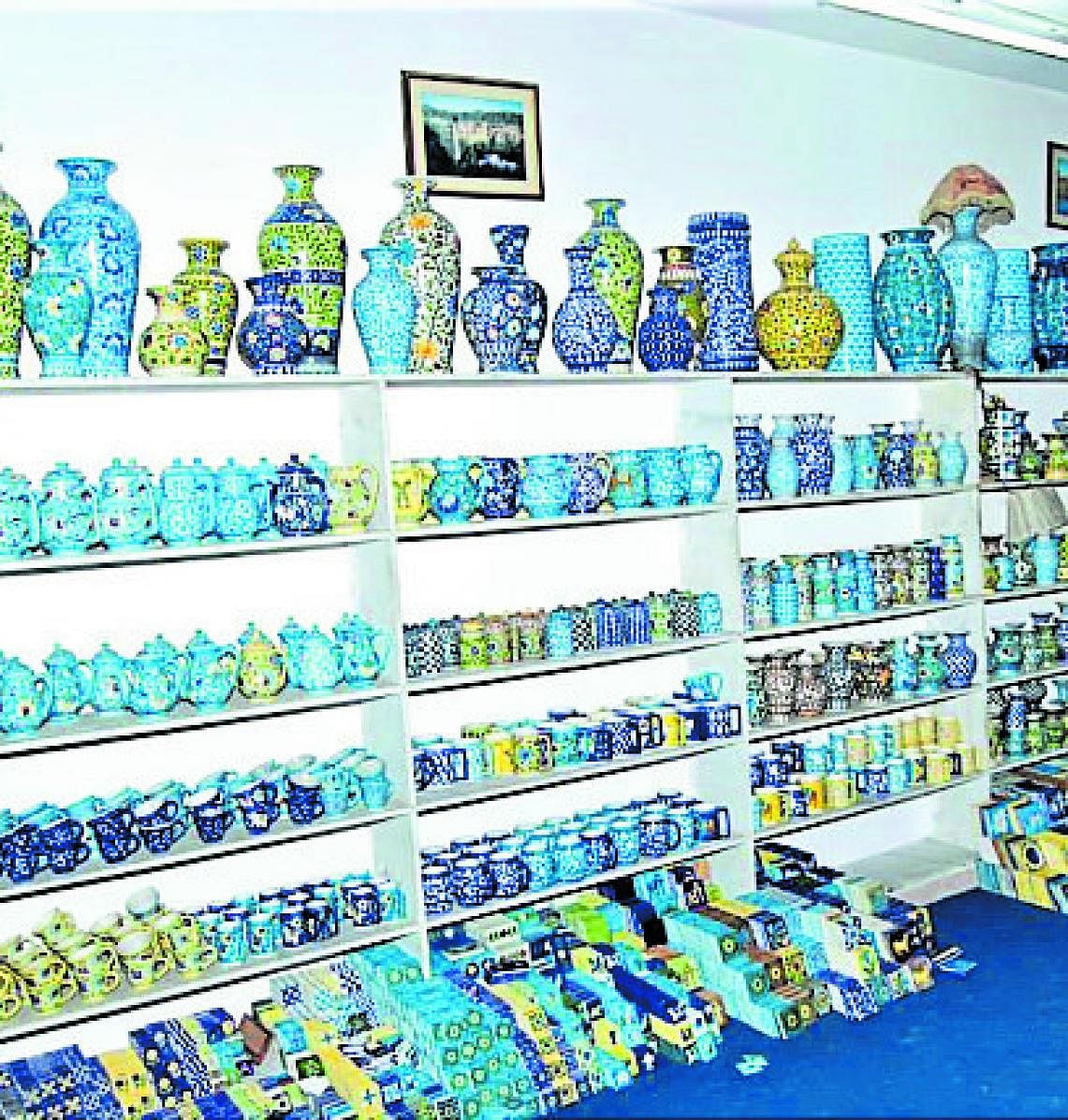 Blue pottery vases and other items at a Jaipur blue pottery shop