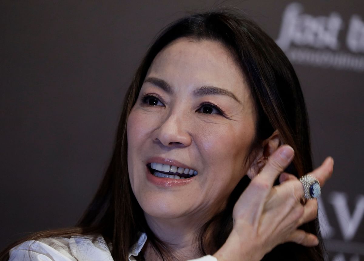 Malaysian actress Michelle Yeoh smiles during a news conference after returning to her home country for the first time since winning her first Oscar for Best Lead Actress, at Kuala Lumpur, Malaysia April 18, 2023. REUTERS/Hasnoor Hussain