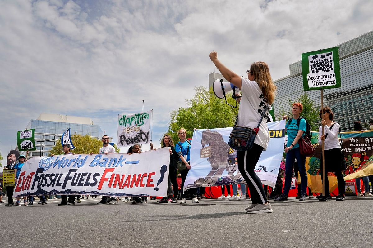 Anti World Bank protestors gather and march near the World Bank and the International Monetary Fund buildings during the International Monetary and FiREUTERS/Ken Cedeno