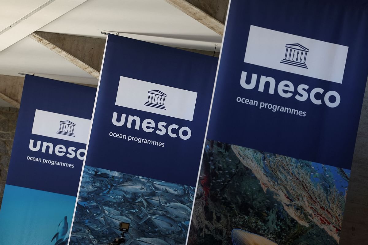 Banners hang at the UNESCO headquarters, on the day of the opening of the second session of negotiations around a future treaty on tackling plastic pollution, in Paris, France, May 29, 2023. REUTERS/Stephanie Lecocq