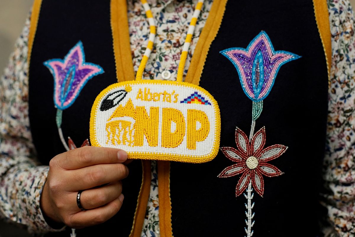 A person holds an accessory that reads "Alberta's NDP", during the provincial election night party of Alberta New Democratic Party  leader Rachel Notley in Edmonton, Alberta, Canada May 29, 2023. REUTERS/Amber Bracken