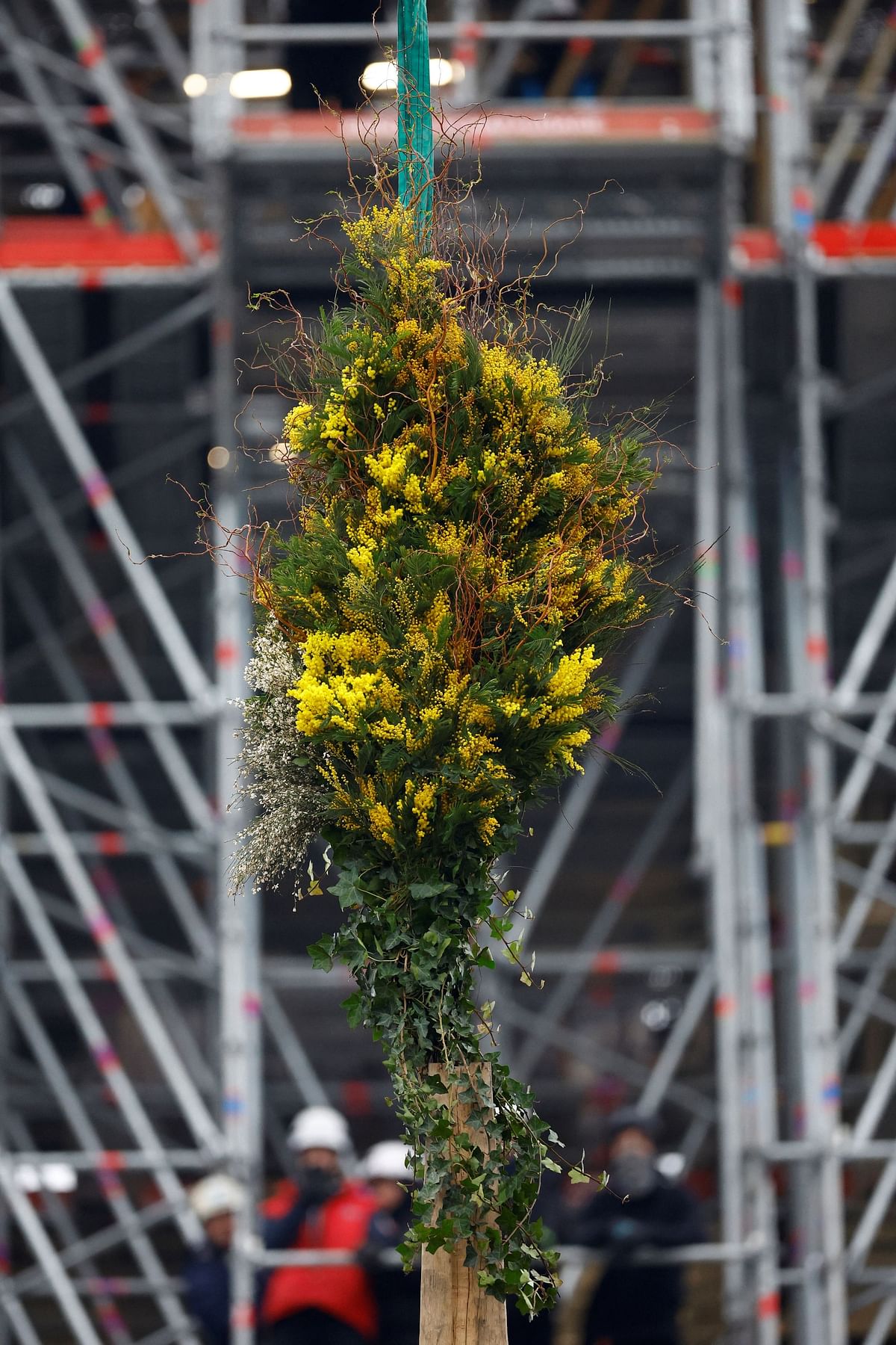 View of the traditionnal bouquet of flowers to celebrate the end of the reconstruction of the medieval choir framework of the Notre-Dame de Paris Cathedral, which was ravaged by a fire in 2019 that sent its spire crumbling down, as restoration works continue before its re-opening, in Paris, France, January 12, 2024. REUTERS/Sarah Meyssonnier