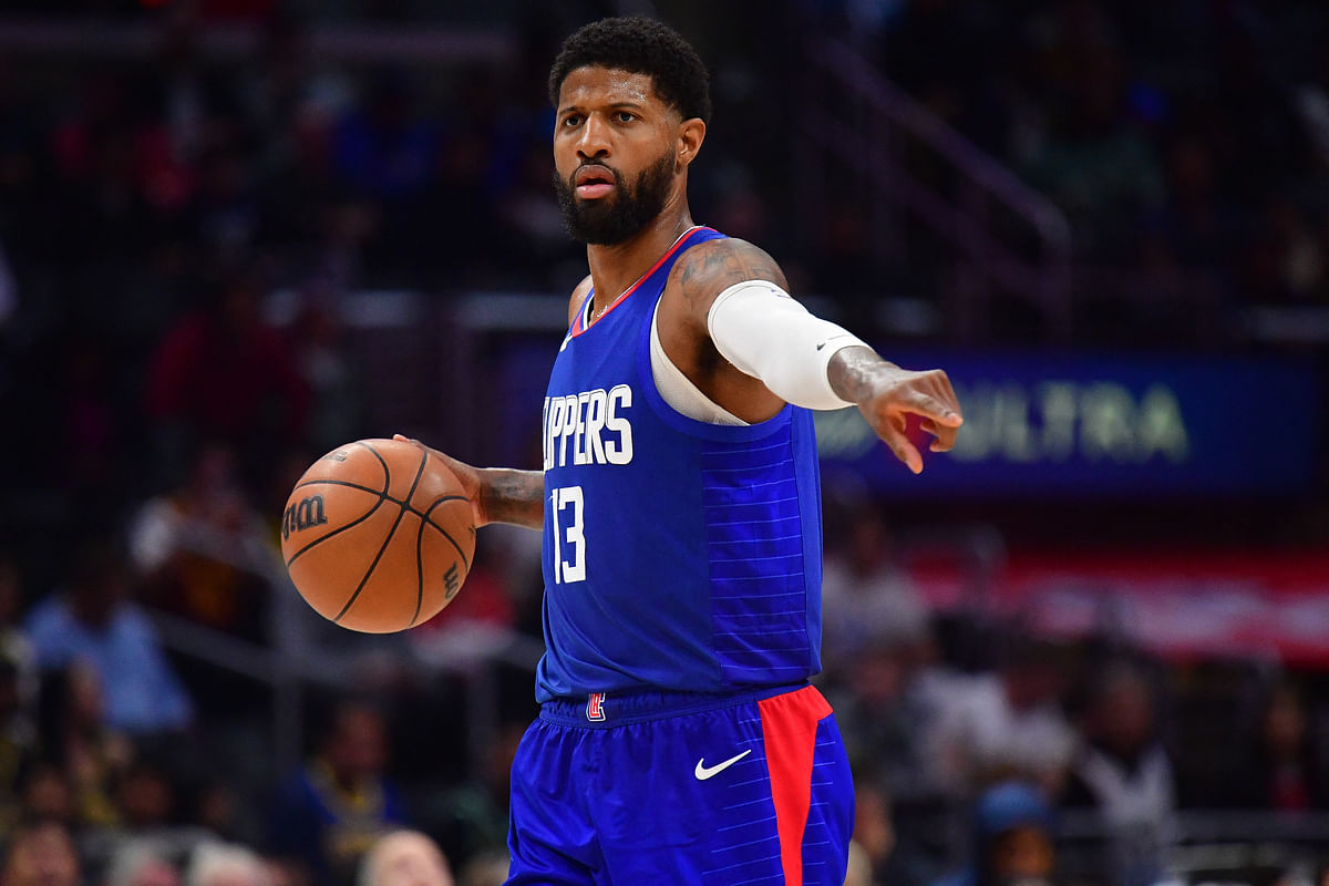 Mar 25, 2024; Los Angeles, California, USA; Los Angeles Clippers forward Paul George  controls the ball against the Indiana Pacers during the second half at Crypto.com Arena. Mandatory Credit: Gary A. Vasquez-USA TODAY Sports