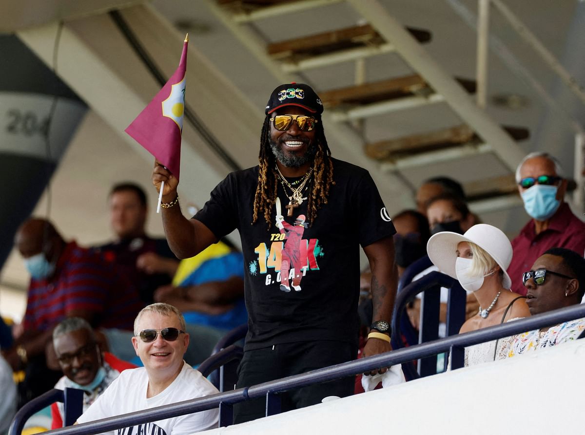 FILE PHOTO: Cricket - Second Test - West Indies v England - The Kensington Oval, Bridgetown, Barbados - March 16, 2022 Former West Indies player Chris Gayle watches from the stand Action Images via Reuters/Jason Cairnduff/File Photo
