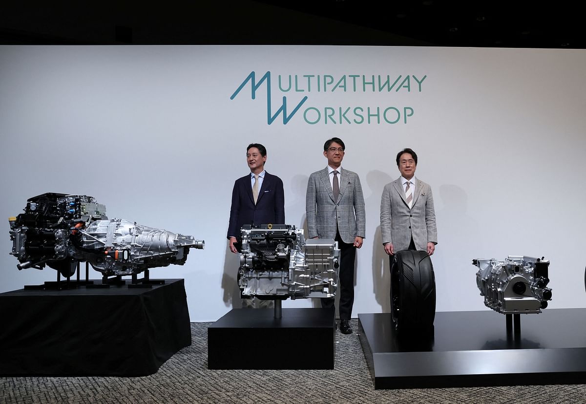 Subaru's CEO Atsushi Osaki, Toyota's CEO Koji Sato and Mazda's CEO Masahiro Moro pose during a photo session at a press conference pledging to each develop a new engine in Tokyo, Japan May 28, 2024. REUTERS/Kim Kyung-Hoon