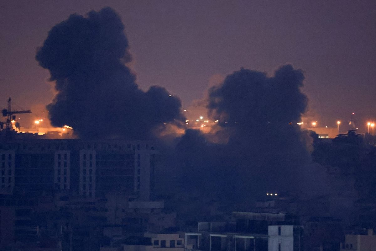 Smoke billows over Beirut southern suburbs after a strike, amid the ongoing hostilities between Hezbollah and Israeli forces, as seen from Sin El Fil, Lebanon October 9, 2024.REUTERS/Mohamed Azakir