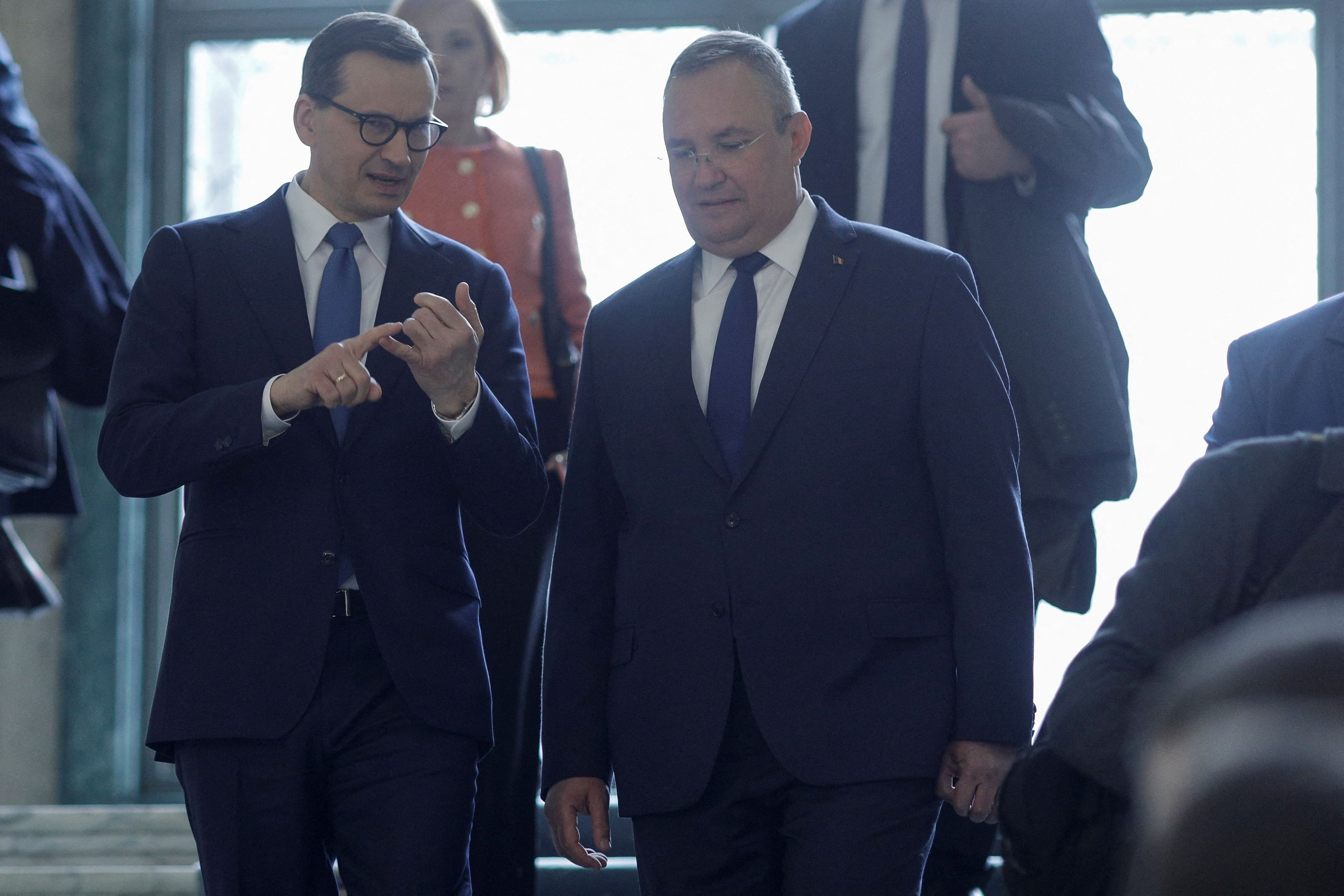 Polish Prime Minister Mateusz Morawiecki and Romanian Prime Minister Nicolae Ciuca arrive for a news conference at the headquarters of the Romanian government during Morawiecki's official visit in Bucharest, Romania, March 28, 2023. Inquam Photos/Octav Ganea via REUTERS ATTENTION EDITORS - THIS IMAGE WAS PROVIDED BY A THIRD PARTY. ROMANIA OUT. NO COMMERCIAL OR EDITORIAL SALES IN ROMANIA