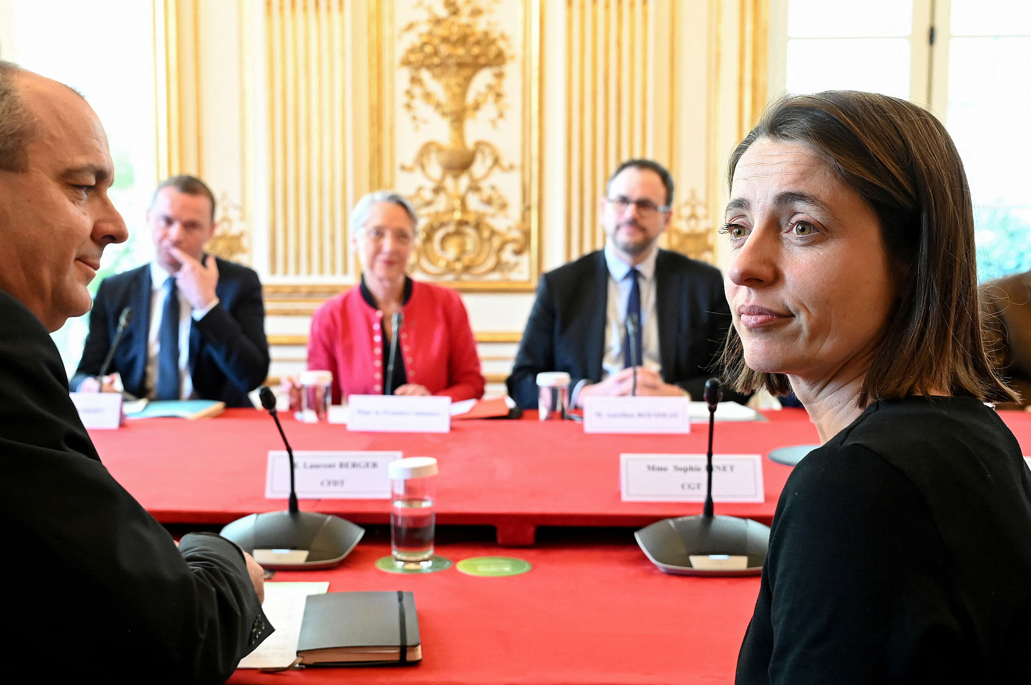 Laurent Berger, French Democratic Confederation of Labour  union's general secretary and Sophie Binet, newly elected CGT trade union general secretary, sit prior to talks between Prime Minister Elisabeth Borne and inter-unions representatives at Hotel de Matignon in Paris, France April 5, 2023 after a pensions reform was pushed through parliament by the French government without a vote, using the article 49.3 of the constitution. Bertrand Guay/Pool via REUTERS