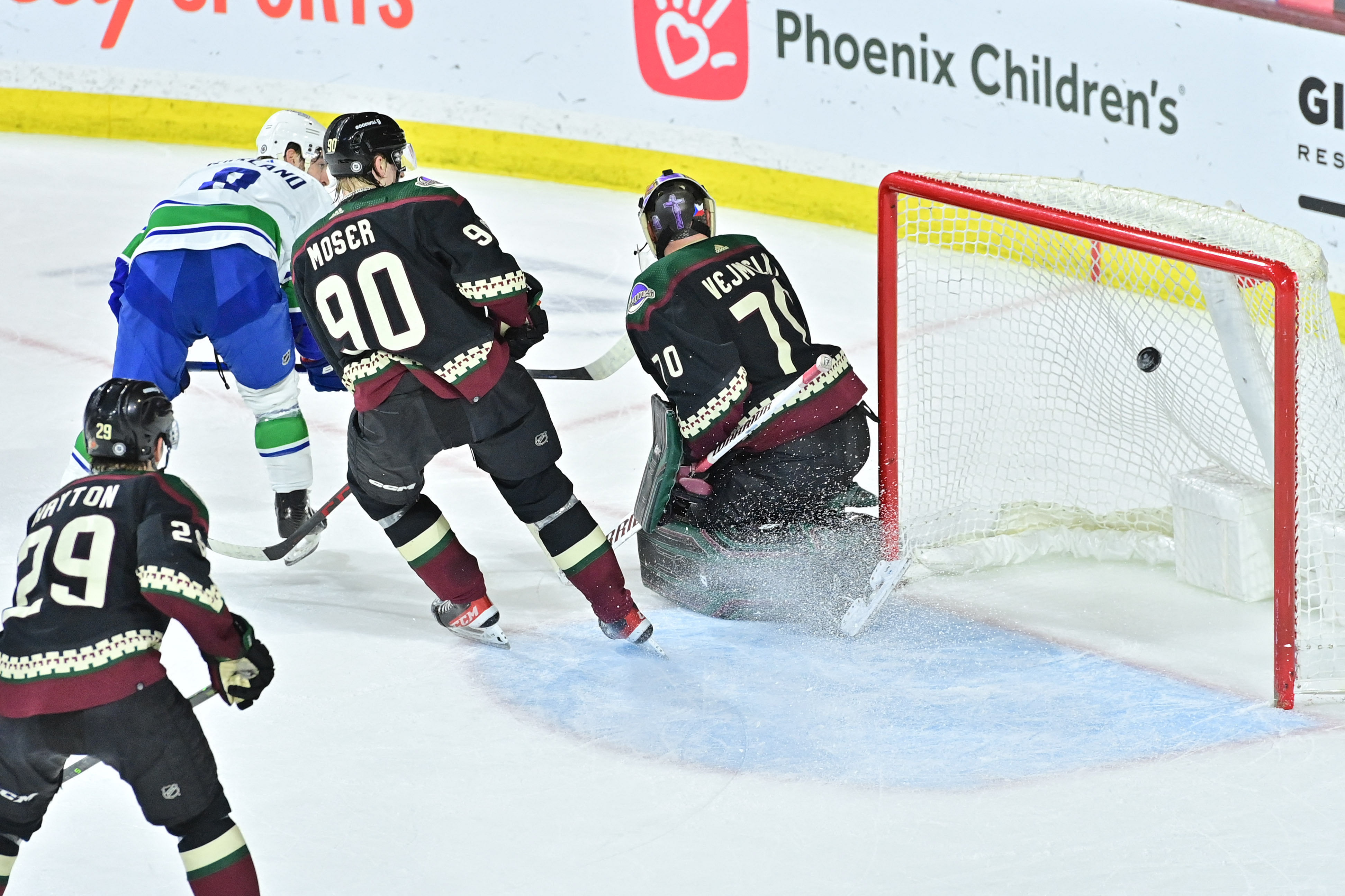 Apr 13, 2023; Tempe, Arizona, USA;  Vancouver Canucks right wing Conor Garland  react in overtime at Mullett Arena. Mandatory Credit: Matt Kartozian-USA TODAY Sports