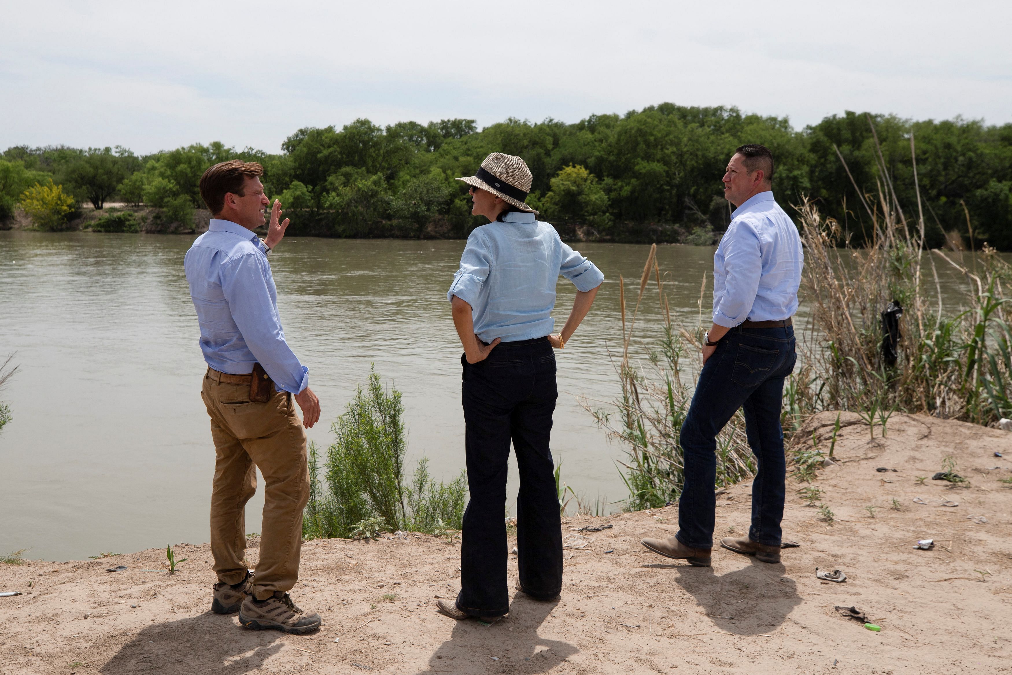 2024 Republican presidential nomination candidate and former U.S. Ambassador to the U.N. Nikki Haley and Rep. Tony Gonzales tour a private property on the banks of the Rio Grande River where a section of Greg Abbott’s Operation Lone Star border fencing stands in Eagle Pass, Texas, U.S., April 03, 2023.    REUTERS/Kaylee Greenlee Beal