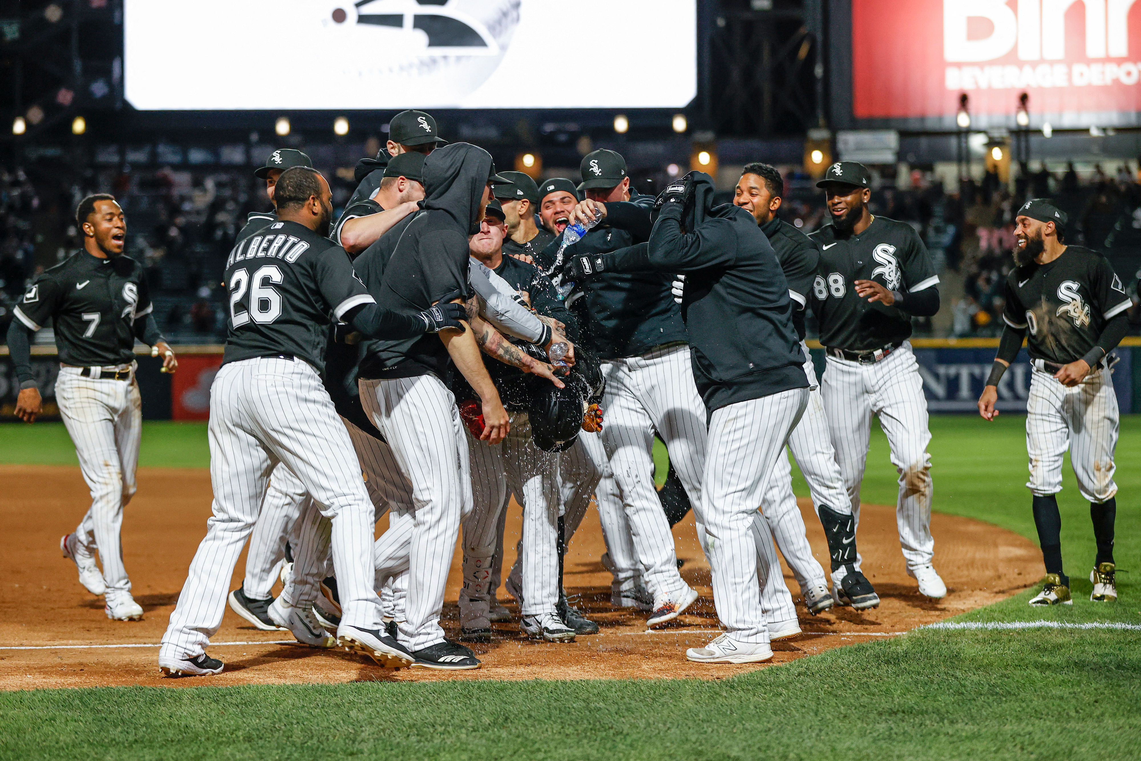 May 2, 2023; Chicago, Illinois, USA; Chicago White Sox left fielder Andrew Benintendi  celebrates with teammates after hitting game winning single against the Minnesota Twins in the 10th inning at Guaranteed Rate Field. Mandatory Credit: Kamil Krzaczynski-USA TODAY Sports