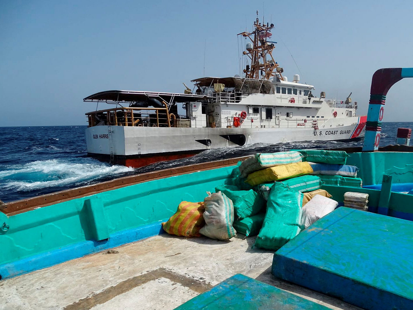 <div class="paragraphs"><p>Bags of illegal drugs sit on the deck of a fishing vessel, transiting international waters after departing Chah Bahar.</p></div>