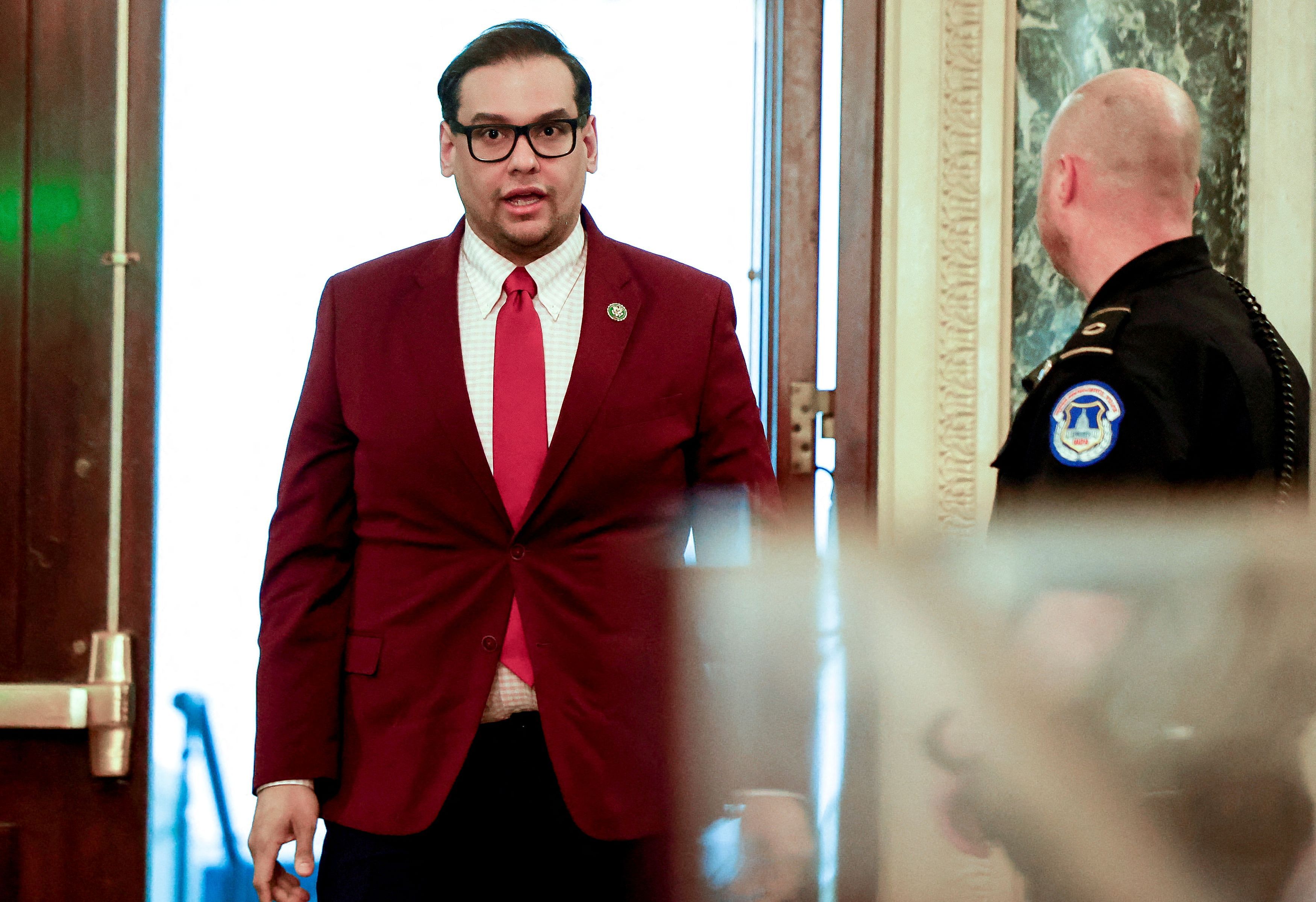 U.S. Rep. George Santos  heads to the floor of the House of Representatives for a vote on a Republican motion to refer a Democratic-sponsored resolution to expel Santos from the House to the House Ethics Committee instead of an immediate explusion vote, on Capitol Hill in Washington, U.S. May 17, 2023.  REUTERS/Evelyn Hockstein     TPX IMAGES OF THE DAY