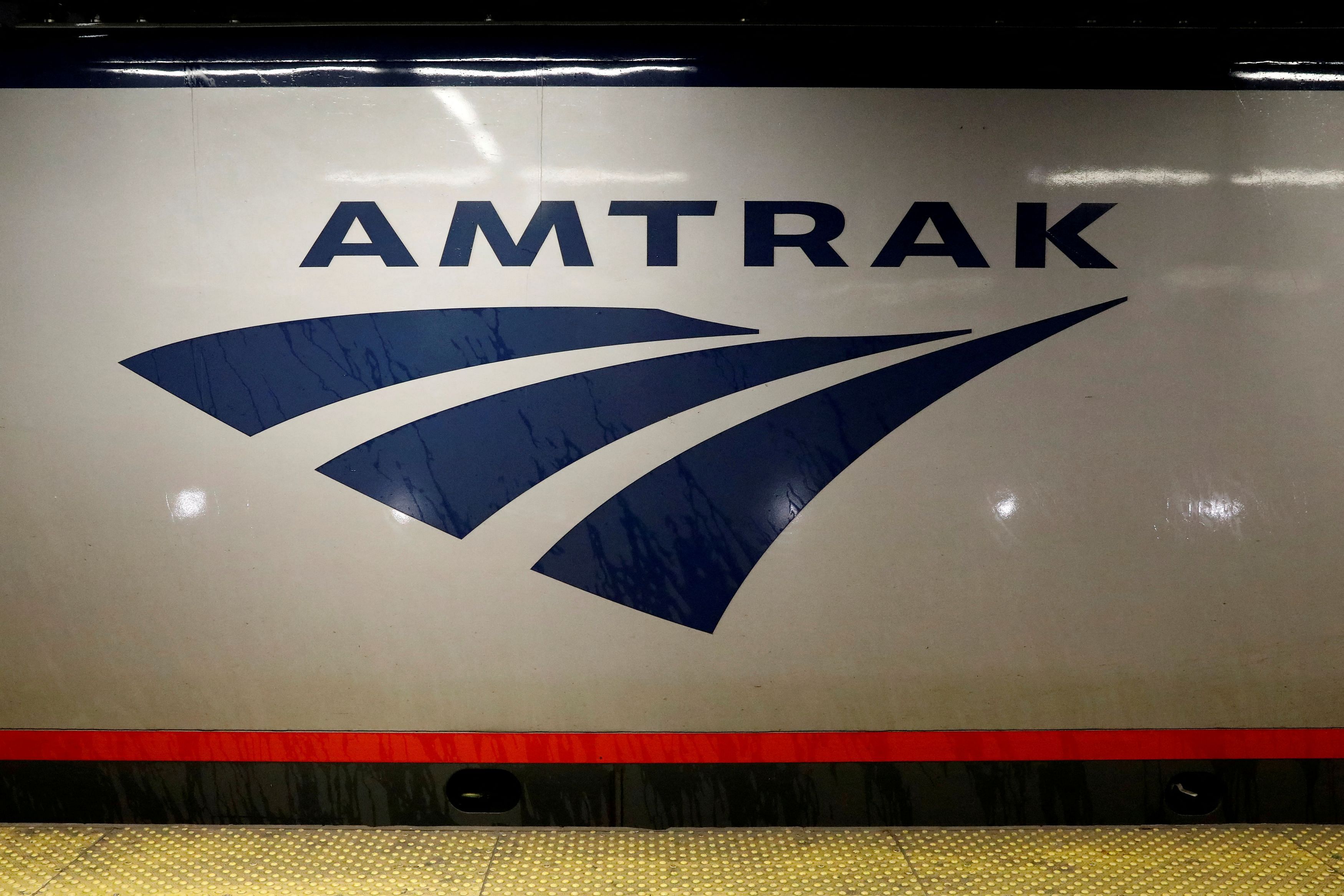 FILE PHOTO: An Amtrak train is parked at the platform inside New York's Penn Station, the nation's busiest train hub, which will be closing tracks for repairs causing massive disruptions to commuters in New York City, July 7, 2017. REUTERS/Brendan McDermid/File Photo