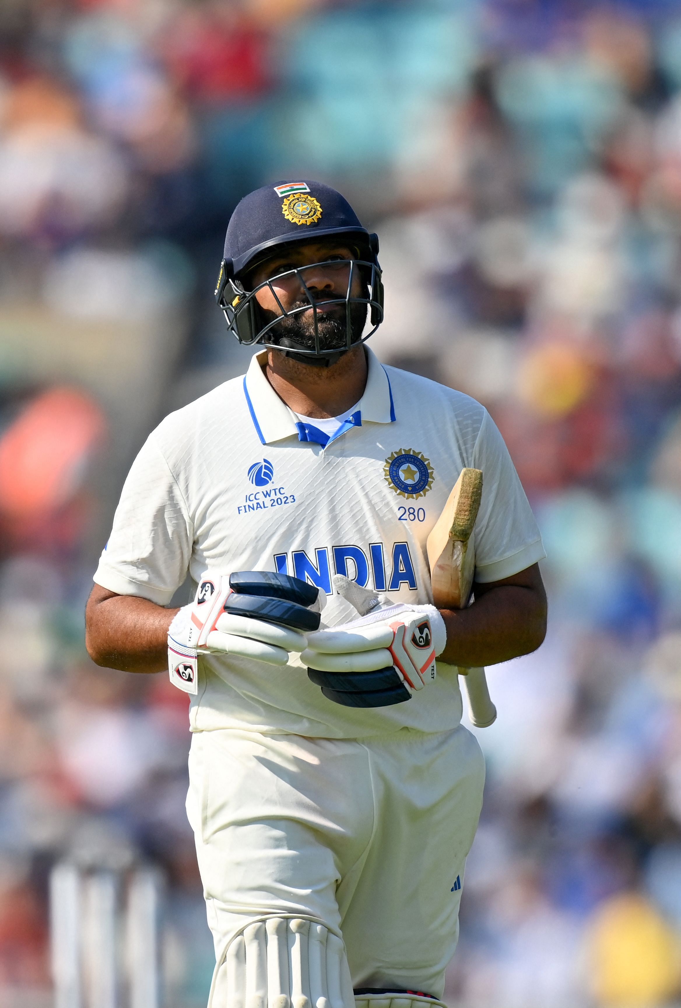 <div class="paragraphs"><p>Cap hero-India's captain Rohit Sharma walks back to the pavilion after his dismissal during play on day 4 of the ICC World Test Championship cricket final match between Australia and India at The Oval, in London, on June 10, 2023. (Photo by Glyn KIRK / AFP) / RESTRICTED TO EDITORIAL USE. NO ASSOCIATION WITH DIRECT COMPETITOR OF SPONSOR, PARTNER, OR SUPPLIER OF THE ECB</p></div>