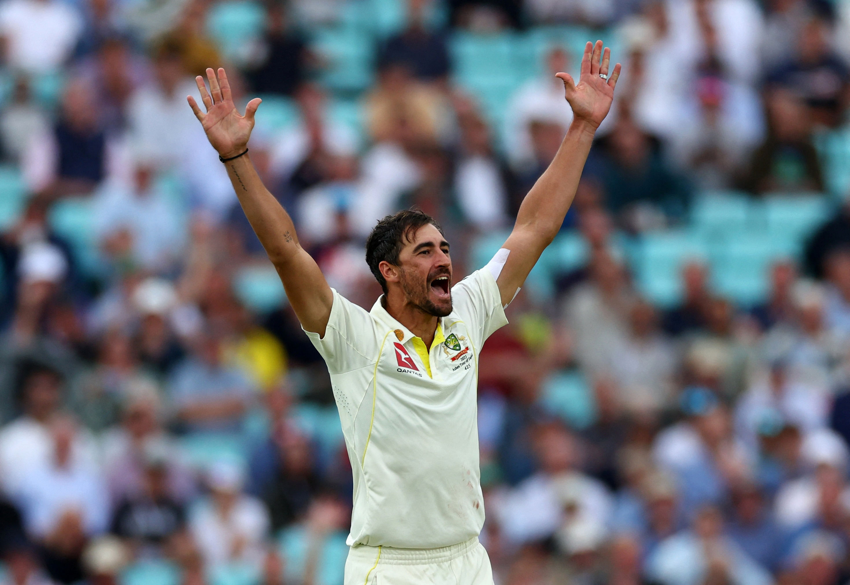 Cricket - Ashes - Fifth Test - England v Australia - The Oval, London, Britain - July 27, 2023 Australia's Mitchell Starc appeals for the wicket of England's Chris Woakes before a DRS review gives it not out Action Images via Reuters/Andrew Boyers