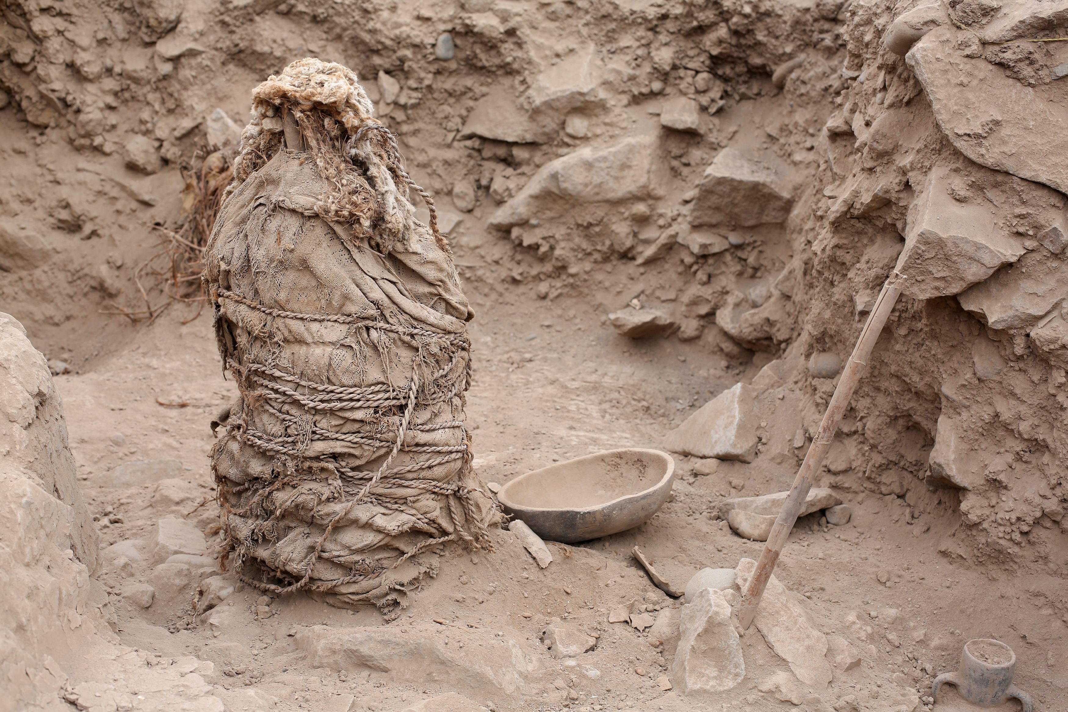 One of five mummies, that according to archaeologists belong to the pre-Inca Ychsma culture that inhabited the central coast of Peru from approximately 900 to 1450 AD., is pictured at the Huaca La Florida archaeological site, in Lima, Peru, November 21, 2023. REUTERS/Anthony Marina NO RESALES. NO ARCHIVES