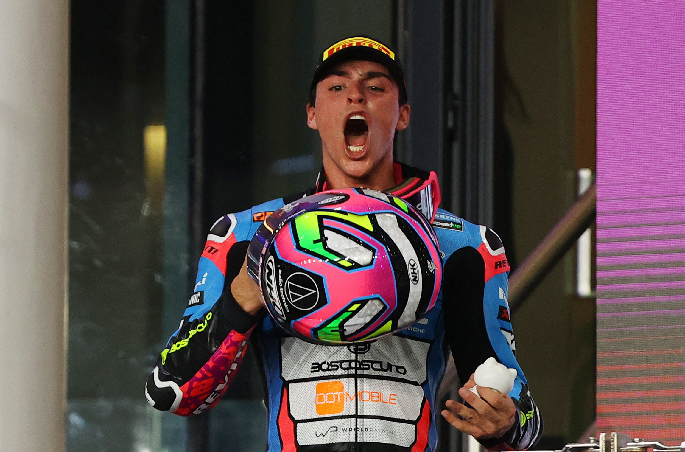 MotoGP - Grand Prix of Qatar - Lusail International Circuit, Lusail, Qatar - March 10, 2024 Sync SpeedUp's Alonso Lopez celebrates on the podium after winning the Moto2 race REUTERS/Ibraheem Al Omari