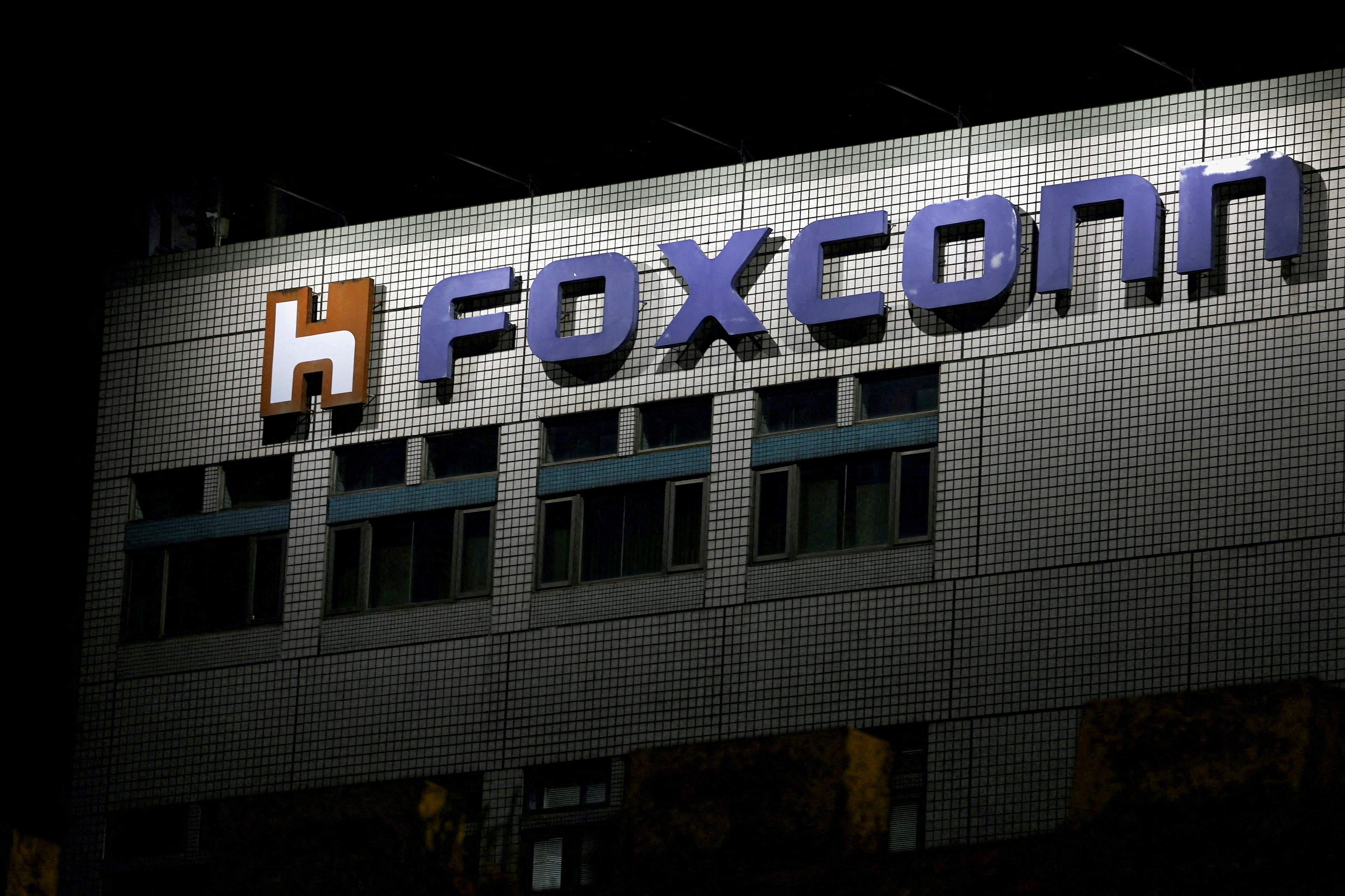 FILE PHOTO: The logo of Foxconn is seen the company's building in Taipei, Taiwan, Nov. 10, 2022. REUTERS/Ann Wang/File Photo