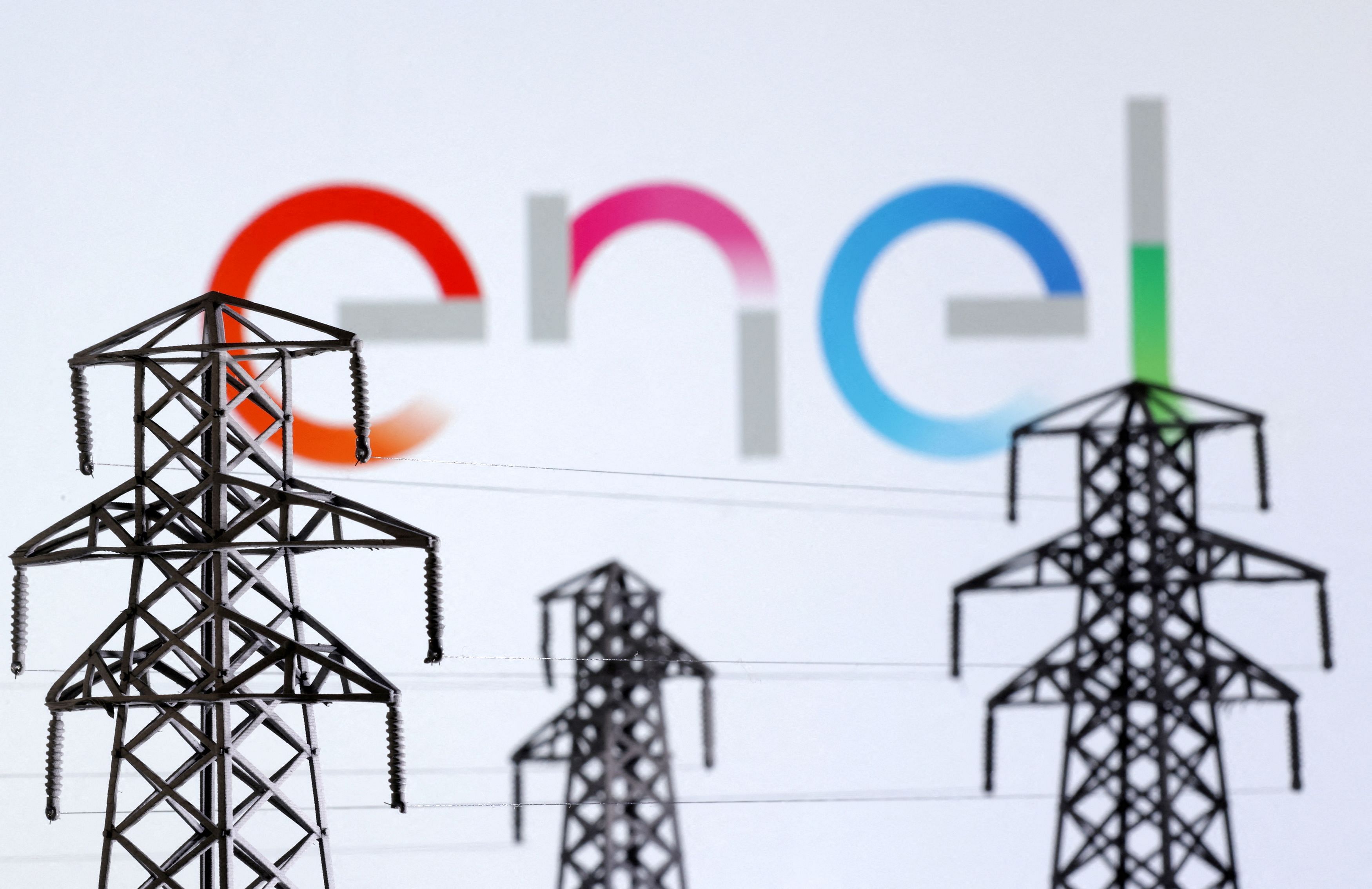 FILE PHOTO: Electric power transmission pylon miniatures and Enel logo are seen in this illustration taken, December 9, 2022. REUTERS/Dado Ruvic/Illustration/File Photo