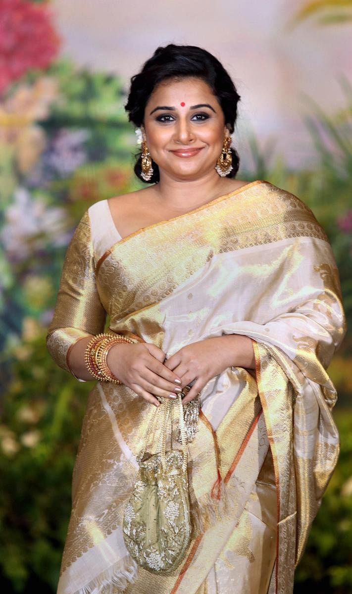 Mumbai: Bollywood actor Vidya Balan poses for a picture during the wedding reception of Bollywood actor Sonam Kapoor and businessman Anand Ahuja in Mumbai on Tuesday. PTI Photo (PTI5_9_2018_000090a)