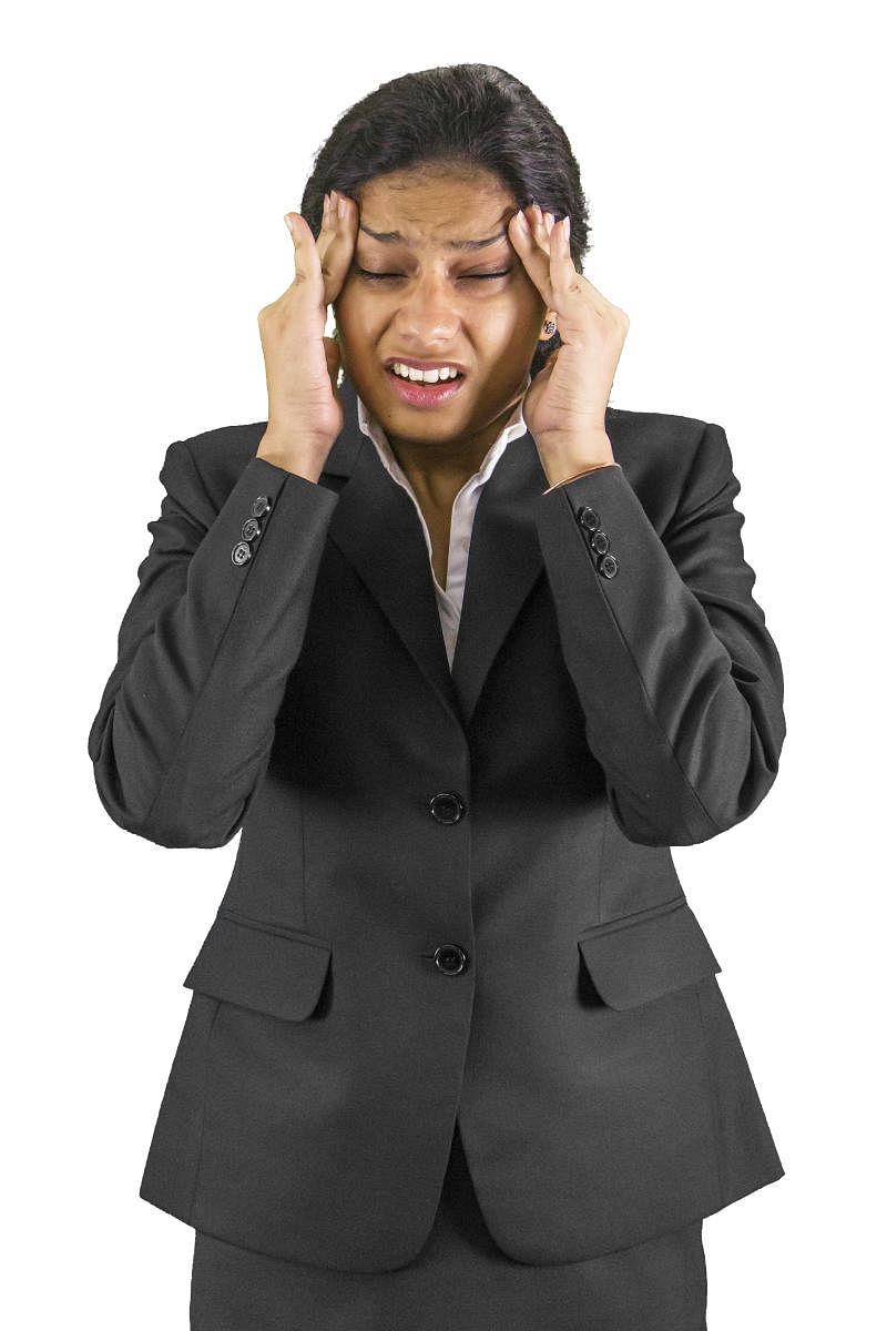 Isolated on white.Businesswoman with a headache.