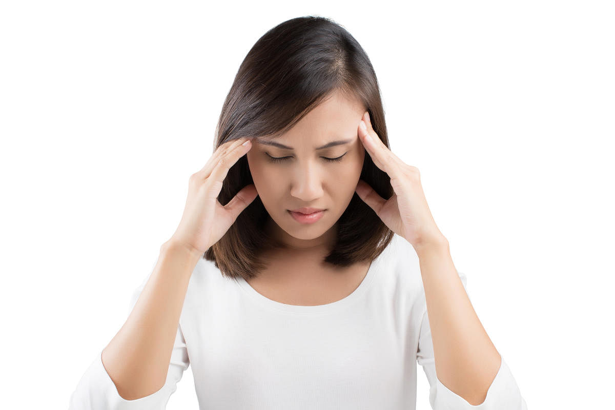Woman having a headacheHealth