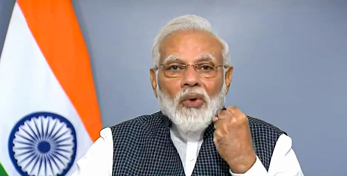 **TV GRAB** New Delhi: Prime Minister Narendra Modi addresses the nation, in New Delhi, Thursday, Aug 8, 2019. (DD News/PTI Photo)(PTI8_8_2019_000199B)