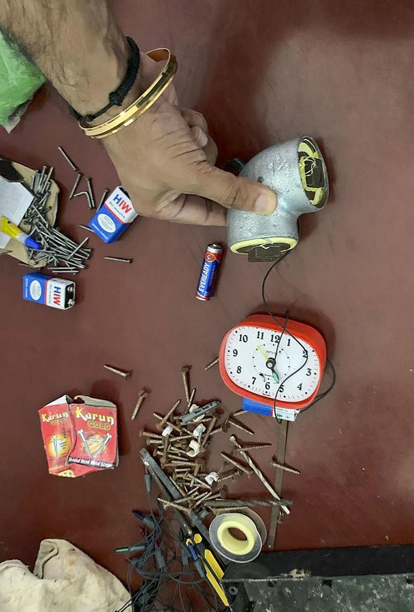 **BEST QUALITY AVAILABLE** Guwahati: Police display IED device recovered from accused Mukadir Islam, Ranjeet Ali and Jameel Luit, who were inspired by the ISIS module and were planning a terror strike at a local carnival in Goalpara district of Assam, during a joint operation by the Delhi Police and Assam Police, in Guwahati, Monday, Nov. 25, 2019. (PTI Photo)(PTI11_25_2019_000169A)