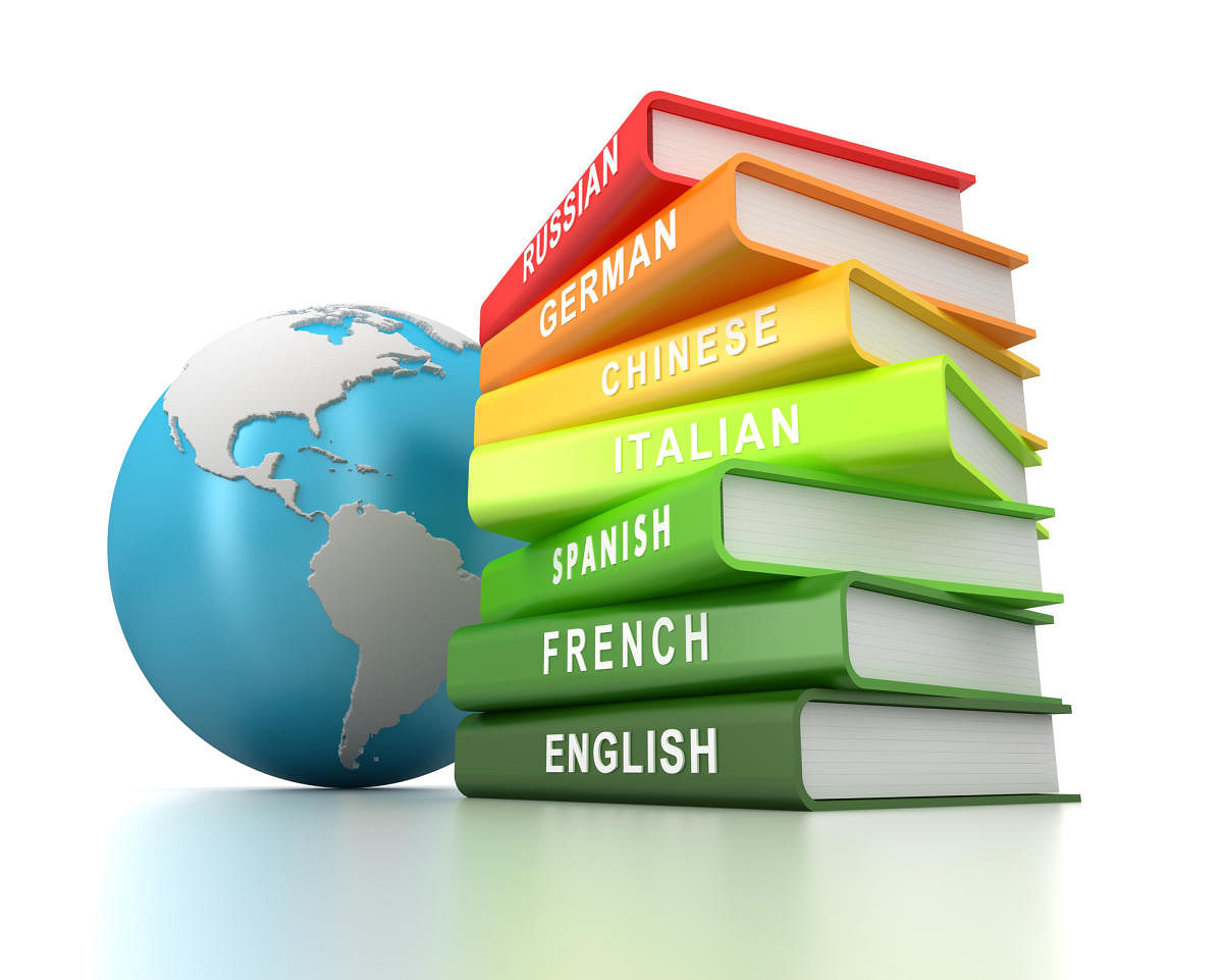 Multilingual Language Books and a blue globeLearning foreign languages