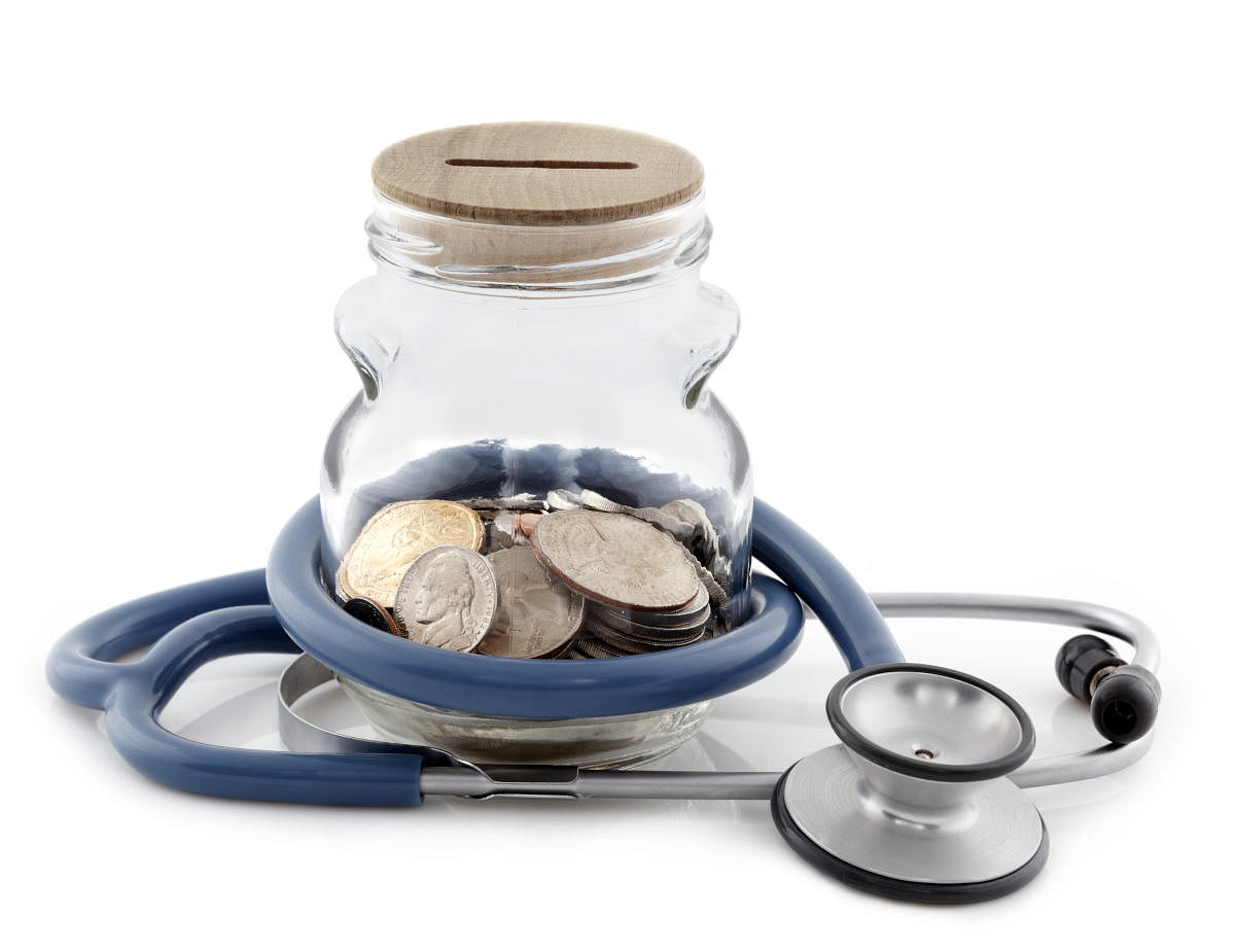 Coin bank with stethoscope, isolated on white background.Women, Festival