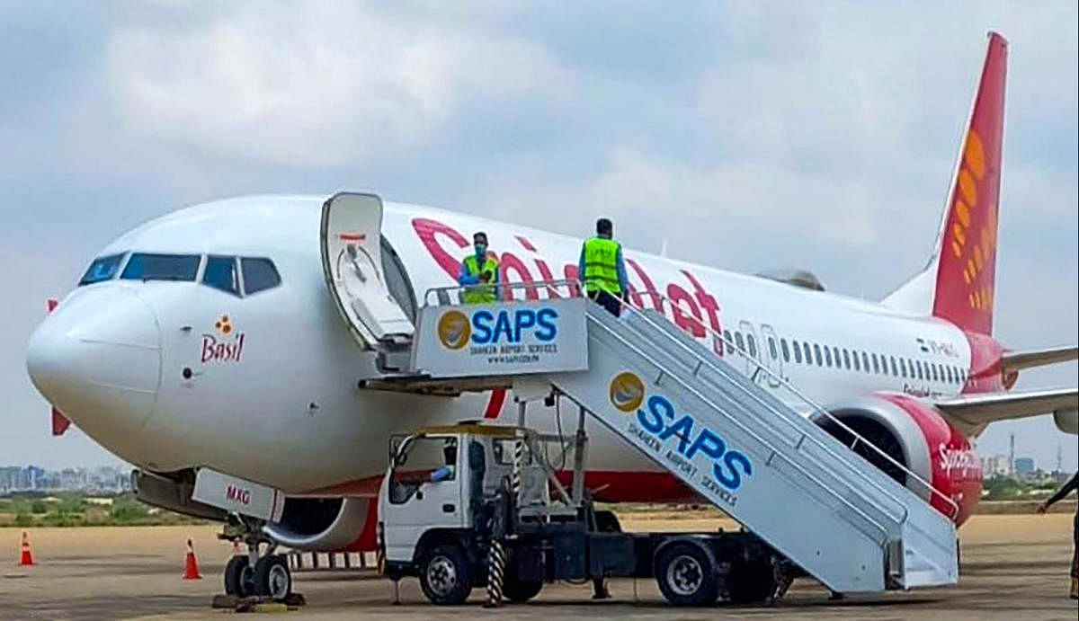 **EDS: TWITTER IMAGE POSTED BY @avpak3 ON TUESDAY, JULY 5, 2022** Karachi: Dubai-bound SpiceJet Boeing 737 Max aircraft after its landing following a fuel indicator malfunction, at Karachi Airport. (PTI Photo)(PTI07_05_2022_000094B)